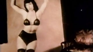 Brunette Witch Entices Audience in Lingerie (1950s Vintage)